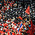 Red-shirted supporters of fugitive former Thai premier Thaksin Shinawatra scuffle with Thai riot police officers during continued anti-government protests in central Bangkok on April 10, 2010.